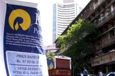 Sensex hits new peak, nears 12,000 mark