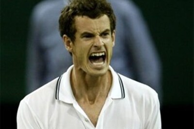 Murray overcomes Wawrinka in tough five-setter