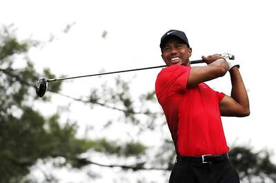 Elbow problem won't be an issue at British Open, says Woods