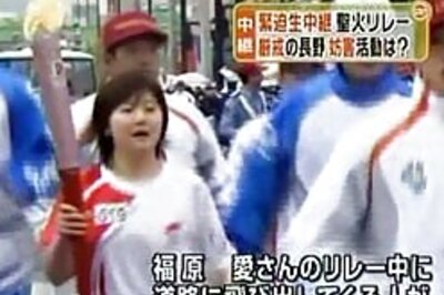 Protesters jeer Olympic torch in Japan