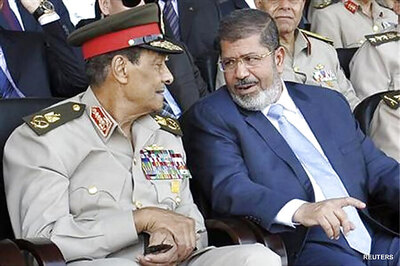 Egypt president sacks defence minister, army chief