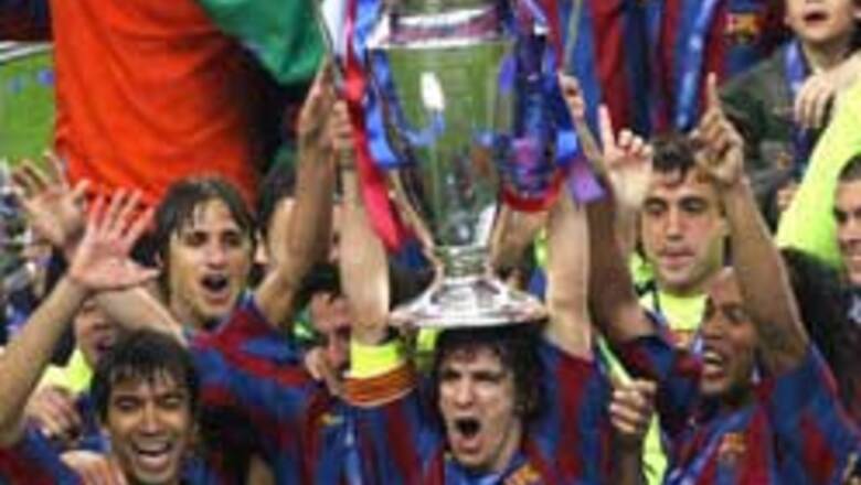 Barca stun Arsenal, crowned champs