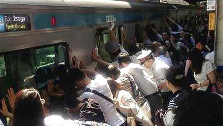 Japan: Passengers push train away to free woman stuck in gap