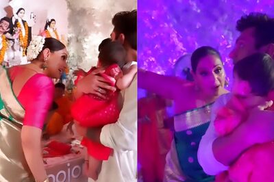 Bipasha Basu Holds Daughter Devi Close at Durga Puja Pandal, Fans Spot John Abraham; Watch