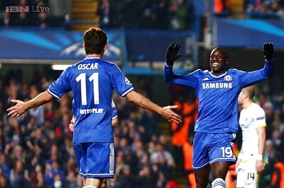 Demba Ba's goal sends Chelsea through as group winners in Champions League