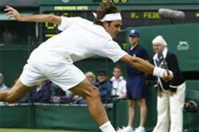 Wimbledon: Hingis, Federer enter Round II