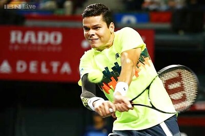 Milos Raonic, Ivo Karlovic advance at Swiss Indoors