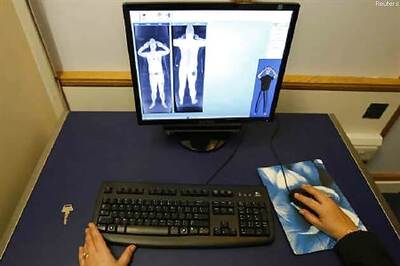 Airport worker caught ogling using scanner