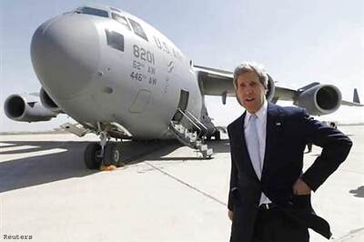 Top US diplomat Kerry asks Iraq to stop arms to Syria