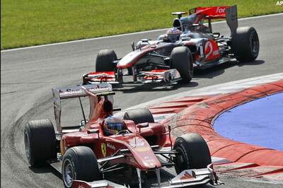 Ferrari's Alonso wins Italian GP, Button 2nd