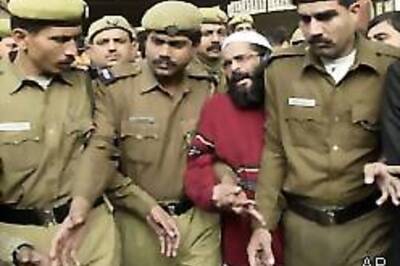 Afzal seeks refuge in books, scriptures