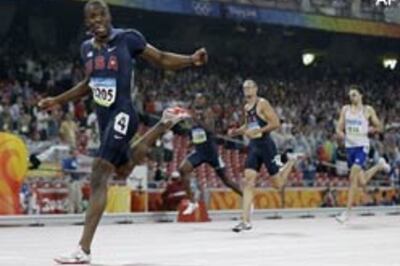 Merritt stuns Wariner to lead US 400m medal sweep