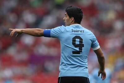 Suarez escapes punishment for alleged punch