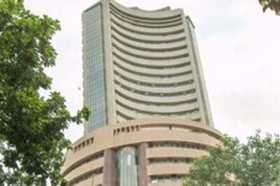 Sensex touches new high of 9014