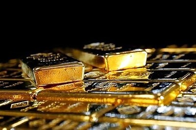 Gold retreats more than 1% as dollar halts slide