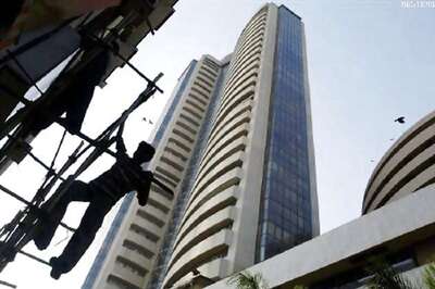Sensex falls over 244 points to close at 26,816.56