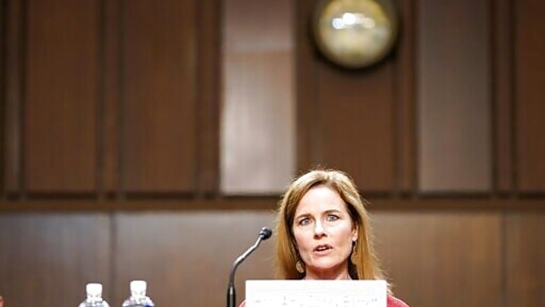 The Latest: Barrett Tells Senators She's Not A Scalia Clone