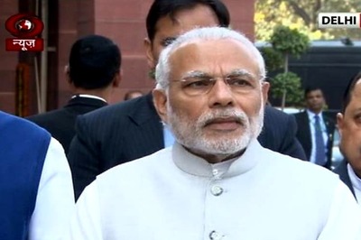 Narendra Modi exchanges pleasantries with opposition leaders in Lok Sabha