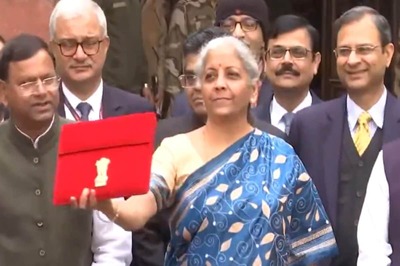 Sitharaman Takes Tablet in Red Pouch to Parliament to Present Paperless Budget
