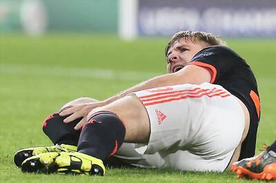 Manchester United's Luke Shaw out for at least six months, says Louis van Gaal