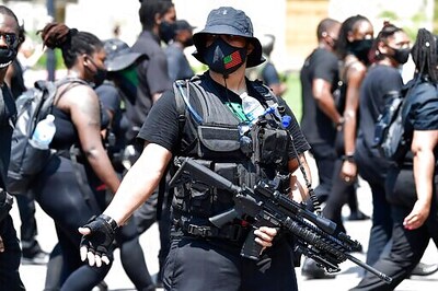 Competing protesters converge on Breonna Taylor's hometown