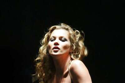 Kate Moss again goes topless for a magazine