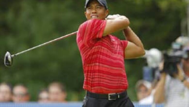 Woods refuses to talk, withdraws from tournament