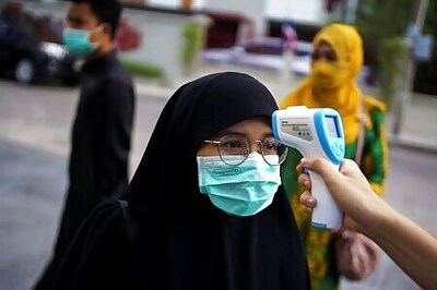 Muslims perform Eid prayers, socially distanced and masked