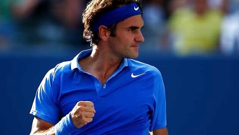 Upbeat Federer undaunted as Djokovic looms again