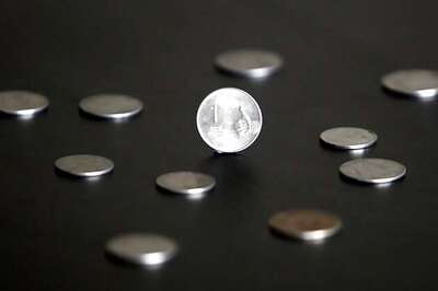 Rupee higher on Manmohan Singh's reforms push