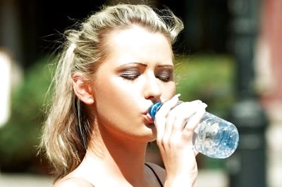 Drinking seven glasses of water can cut 200 calories off daily intake