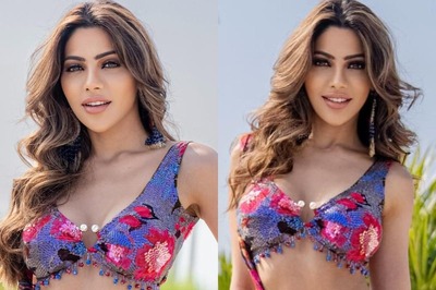 Sexy! Nikki Tamboli Flaunts Ample Cleavage In Red Floral Blouse; Check Out Viral Photos