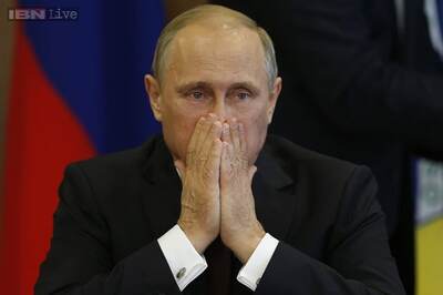 Putin calls for cease-fire after attack on MH17