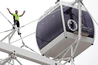 High-wire daredevil Nik Wallenda scales new Orlando Eye