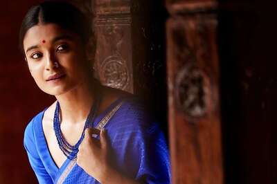 Chaithra Achar Spices Things Up With Her Playful Poses In Saree