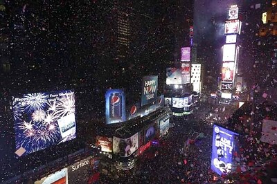 Ball drops in New York City's Times Square, ushering 2014