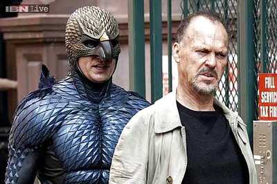 'Birdman' takes flight at an Oscars punctuated by politics, takes home best film, director