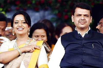 Fadnavis's wife faces flak for accepting necklace produced in thin air by self-styled godman