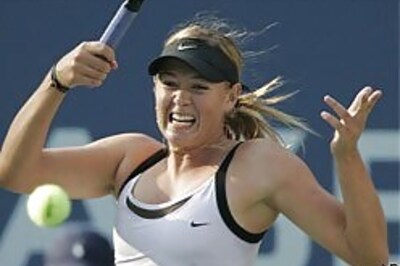Sharapova, Henin-Hardenne enter final