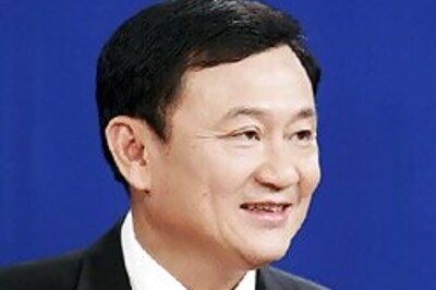 'Thaksin to return as PM in 18 mnths'