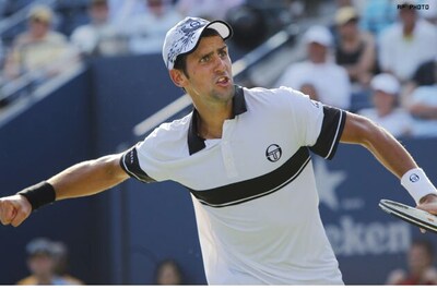 US Open: Djokovic fights back to beat Troicki