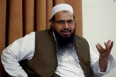 Uproar in Rajya Sabha over Ramdev aide's meeting with Hafiz Saeed