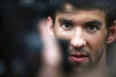 Phelps starts life out of the water