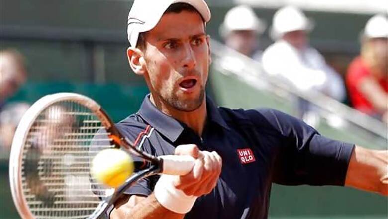 Djokovic, Azarenka advance in French Open