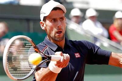 Djokovic, Azarenka advance in French Open