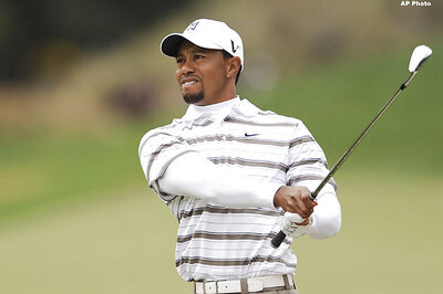 Woods beats McIlroy to advance to World Golf semis