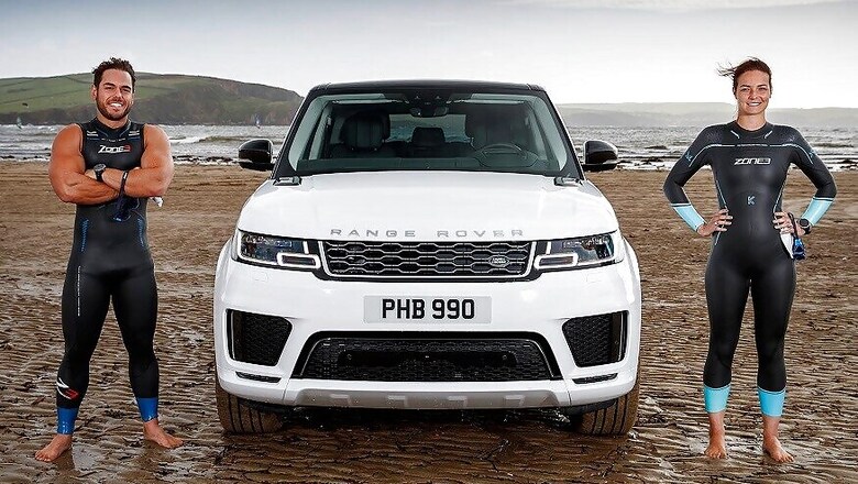 Range Rover Sport PHEV Races With Pro Swimmers in Sea [Video]