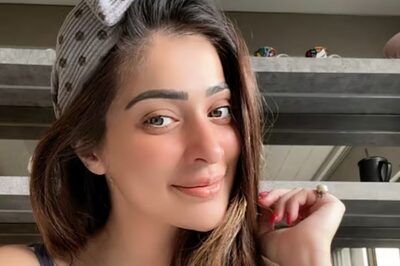 Actress Raai Laxmi Looks Stunning In White Crop Shirt And Thigh-high Slit Skirt