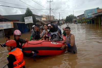 Death Toll in Flash Flood Rises to Eight in Indonesia