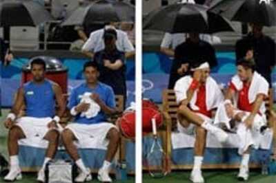 Rain stops Paes-Bhupathi and Federer-Wawrinka match